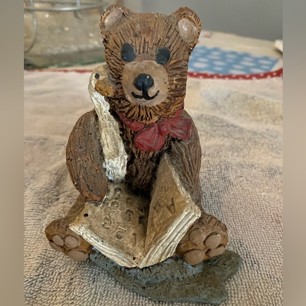 Brown Bear Figurine with Red Bow and Open Book